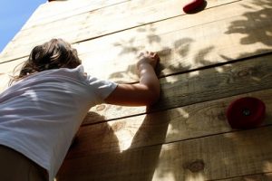 A young girl climbing